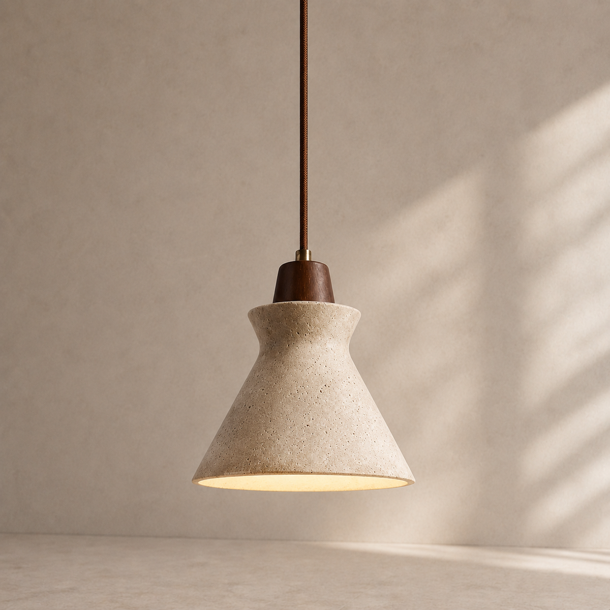 Vela Sculptural Travertine Bell Pendant Light