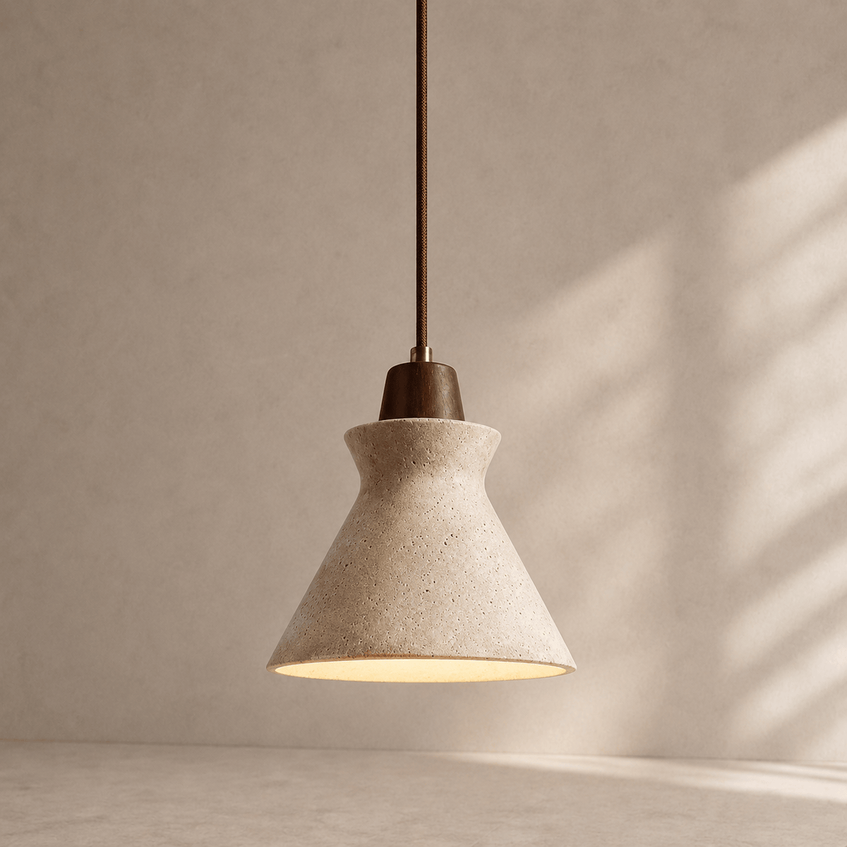 Norven Living Vela Sculptural Travertine Bell Pendant Light